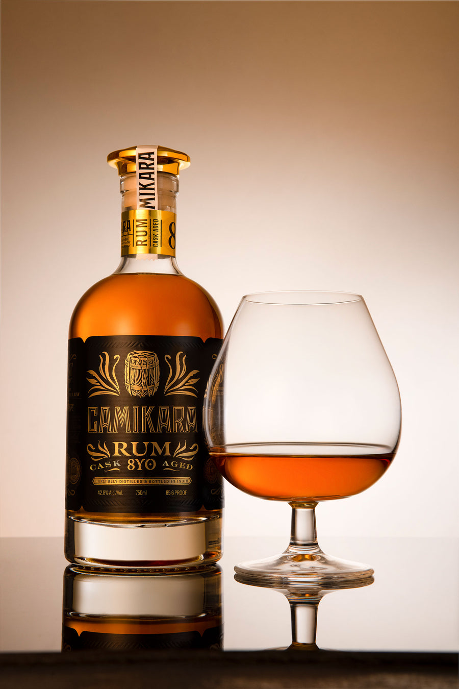 Camikara 8 Years Indian rum 70cl with a snifter glass